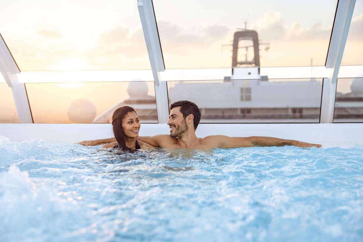 A couple in a hot tub onboard a MSC Cruise ship
